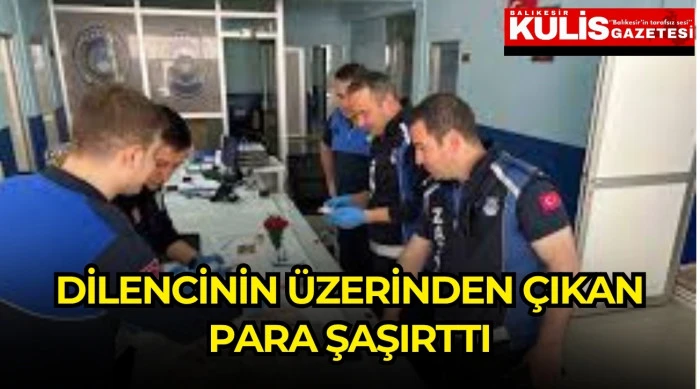 Dilencinin &uuml;zerinden &ccedil;ıkan para şaşırttı